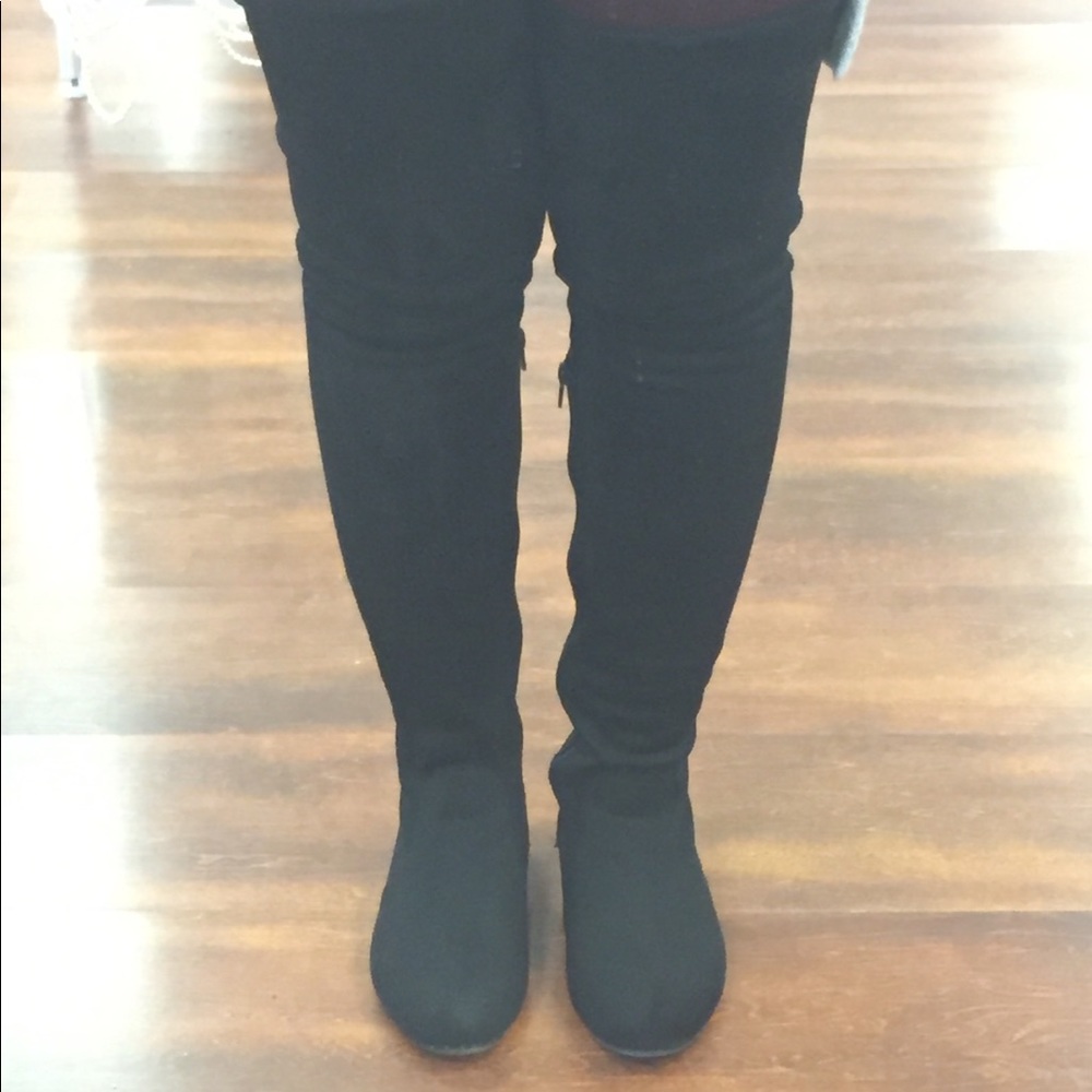 Thigh high black suede boots